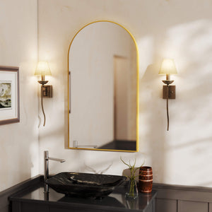 Bathroom interior with a mirror, sink, and wall lights.