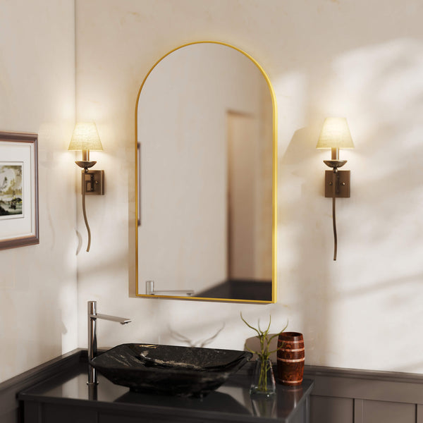 Bathroom interior with a mirror, sink, and wall lights.